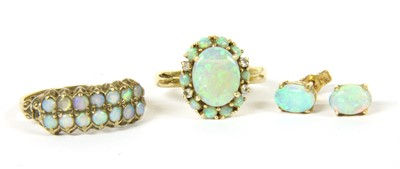 Lot 18A - A Continental opal cluster ring