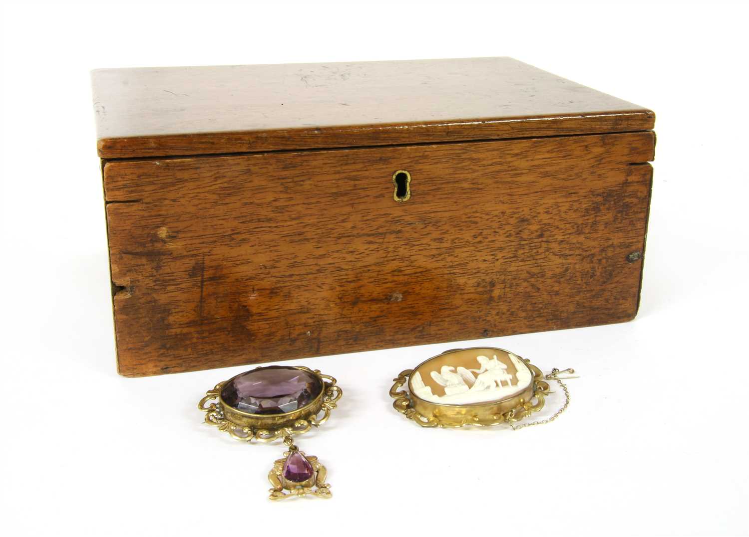 Lot 3 - A Victorian rolled gold amethyst brooch with drop pendant