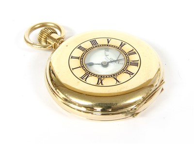 Lot 28 - A rolled gold top wind precision half Hunter pocket watch