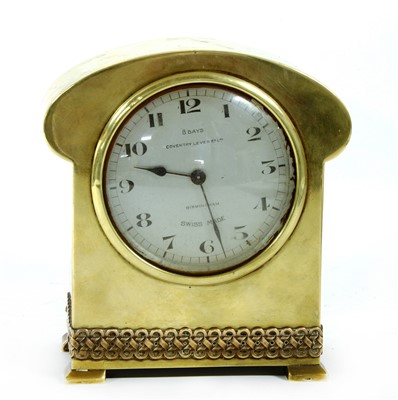 Lot 118 - A late 19th century brass and copper mantle clock