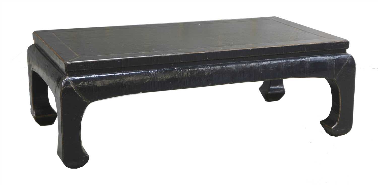 Lot 14 - An Oriental black lacquered coffee table