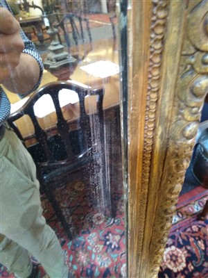 Lot 49 - A large Victorian gilt gesso overmantel mirror
