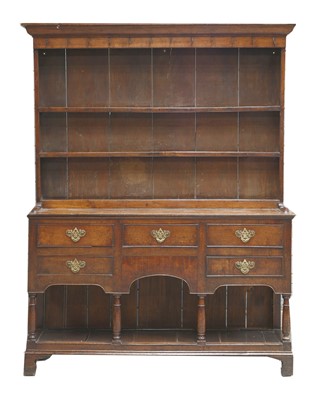 Lot 338 - A George III oak pot-board dresser