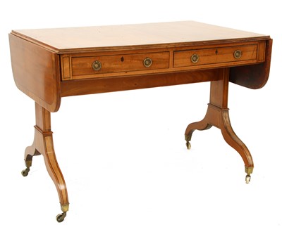 Lot 34 - A Regency strung satinwood(?) sofa table