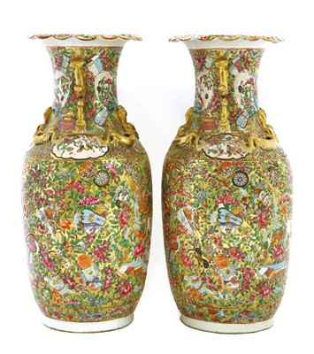 Lot 44 - A pair of Chinese Canton enamelled famille rose vases