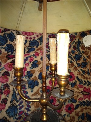 Lot 240 - A pair of brass three-light table lamps