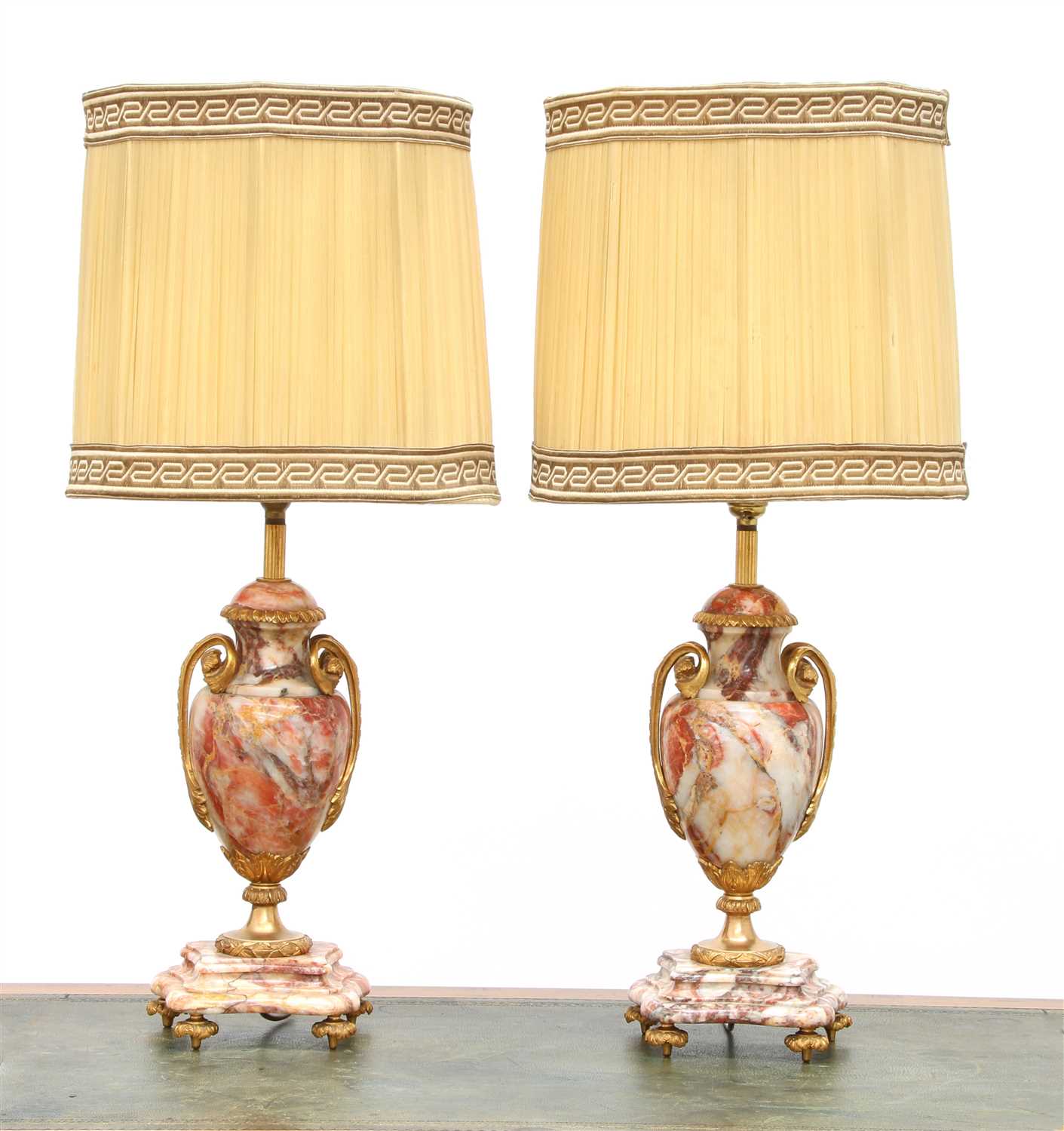 Lot 233 - A pair of rouge veined marble table lamps
