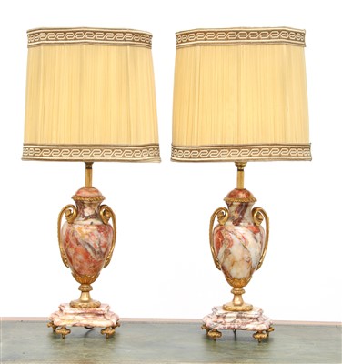 Lot 233 - A pair of rouge veined marble table lamps