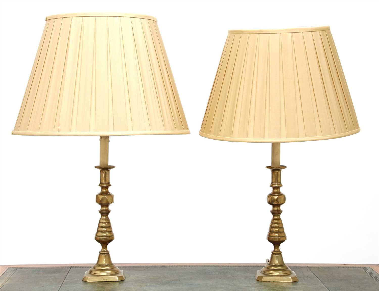 Lot 299 - A pair of brass candlestick table lamps