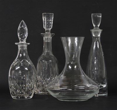Lot 199 - A collection of cut glass vases and decanters