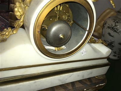 Lot 32 - A French alabaster and ormolu mantel clock