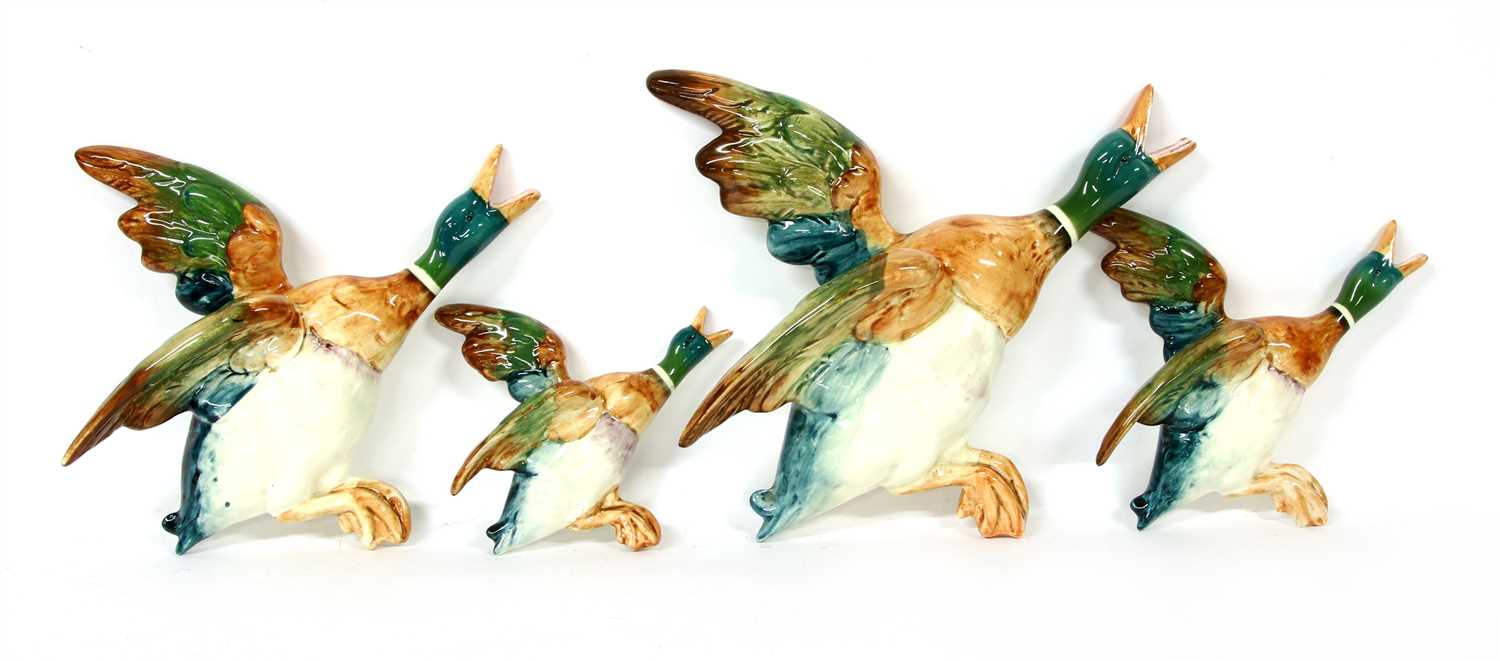 Lot 139 - A set of four graduated Beswick flying ducks