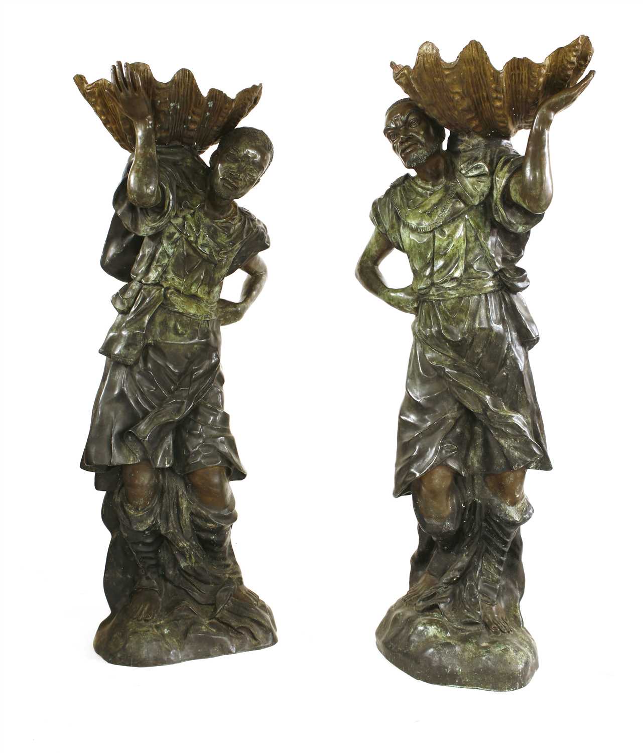 Lot 22 - A pair of life-sized green patinated bronze blackamoors