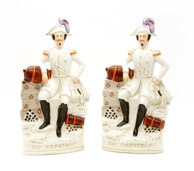 Lot 146 - A pair of 19th century Staffordshire figures of Napoleon