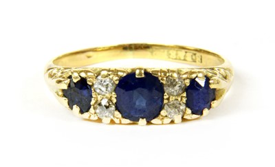 Lot 9 - A three stone sapphire ring