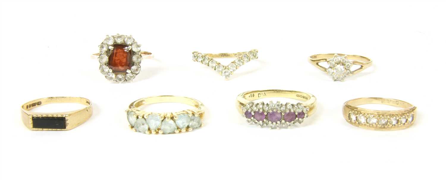 Lot 2 - A collection of seven gold and stone set rings