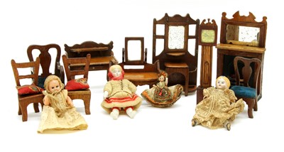 Lot 101 - A collection of wooden dolls house furniture