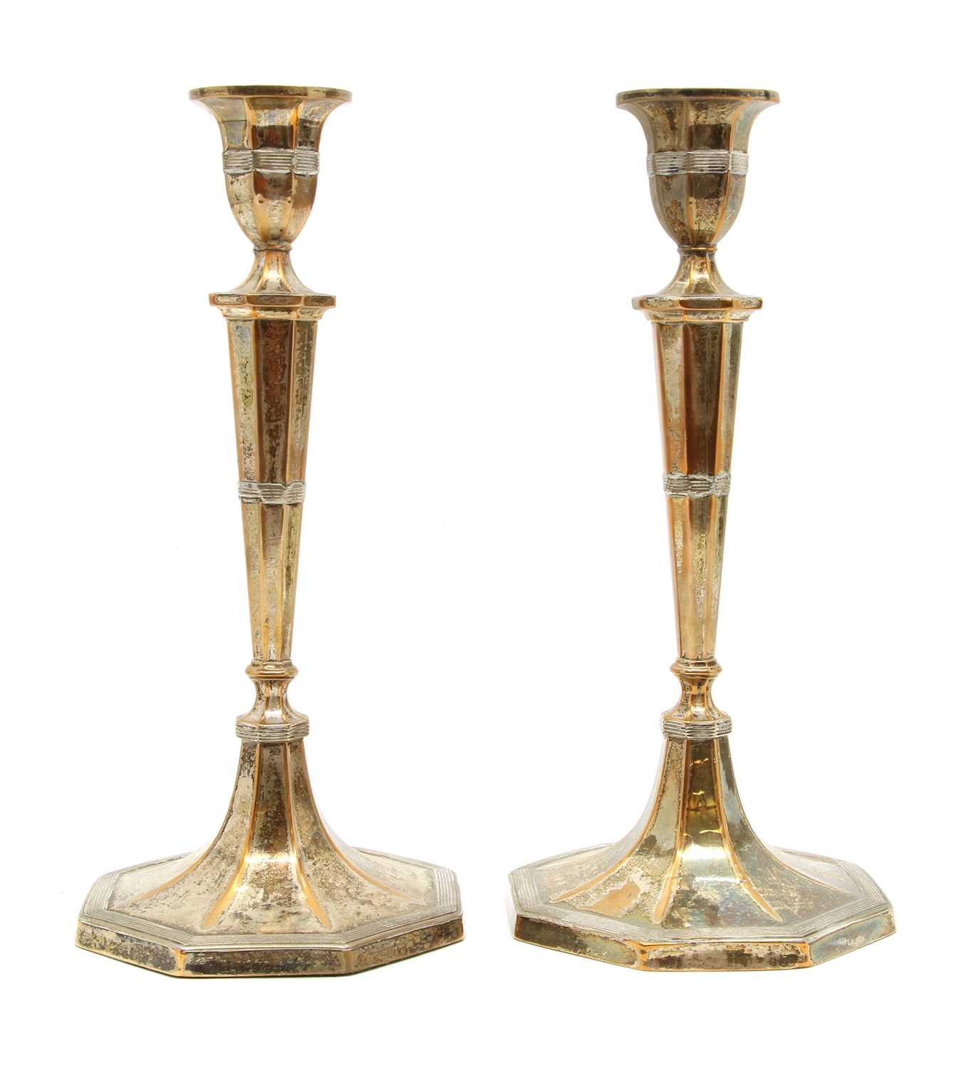 Lot 116 - A pair of Old Sheffield plate candlesticks