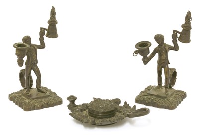 Lot 121 - An unusual pair of William IV bronze 'Go To bed' candlesticks