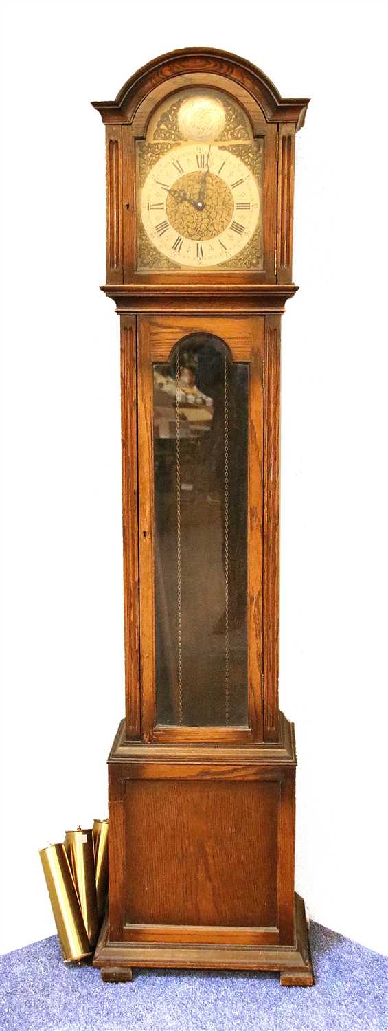 Lot 272 - A 1930s oak longcase clock