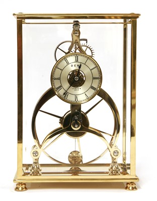 Lot 798 - A polished brass skeleton clock