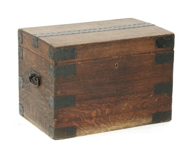 Lot 317 - A 19th century oak and wrought iron bound silver chest