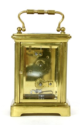 Lot 99 - A brass carriage clock