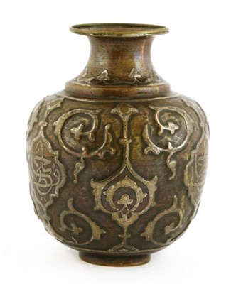 Lot 145A - An Islamic copper vase