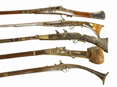 Lot 553 - Five South Indian or Sri Lankan flintlock long guns