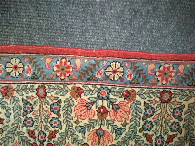 Lot 460 - An hand knotted Persian rug