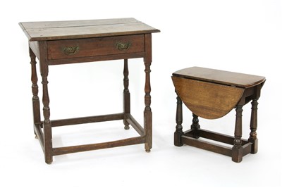 Lot 313 - An 18th century oak table