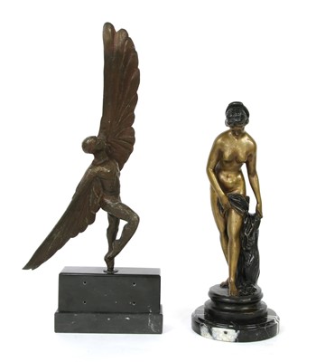 Lot 119 - A bronze figure of a scantily clad female nude