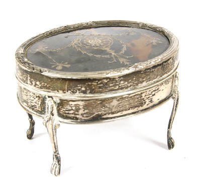 Lot 100 - An Edwardian tortoiseshell and silver jewellery box