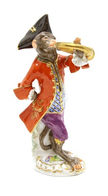 Lot 94 - A Meissen porcelain monkey band figure playing the French horn