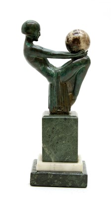 Lot 356 - An Art Deco hardstone figure of a seated nude