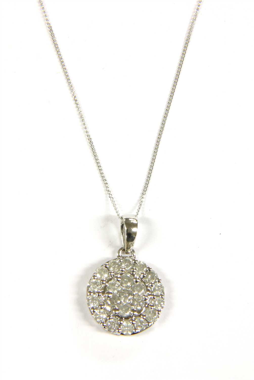 Lot 14 - A white gold diamond cluster pendant