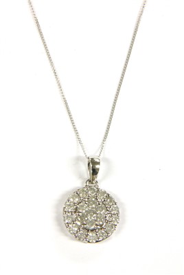 Lot 14A - A white gold diamond cluster pendant