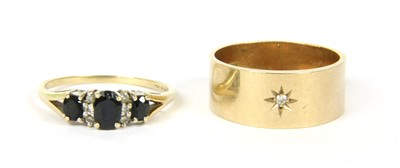 Lot 18 - A 9ct gold diamond set wedding ring