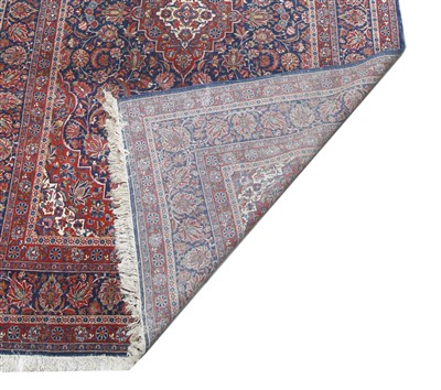 Lot 317 - A Kashan carpet