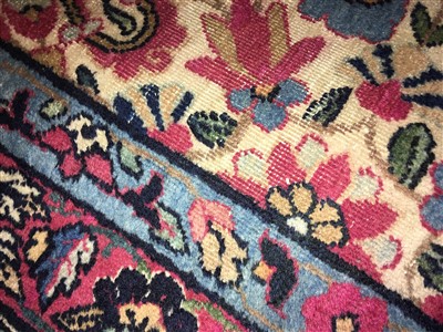 Lot 36 - A Kirman carpet