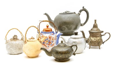 Lot 167 - A large collection of approximately forty teapots