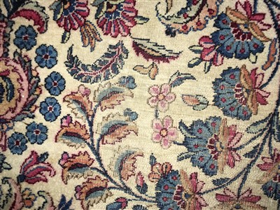 Lot 206 - A Kirman carpet