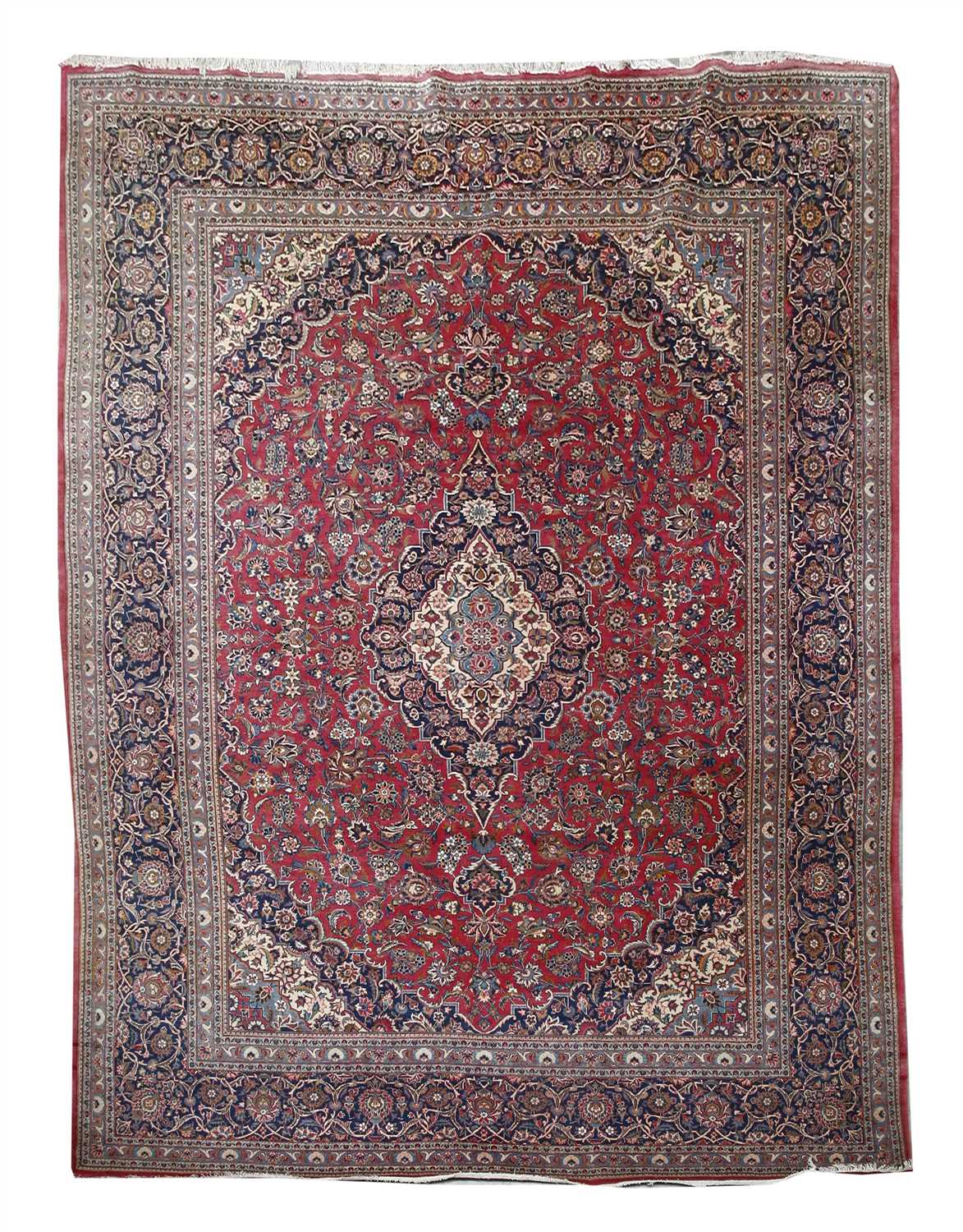 Lot 217 - A Kashan carpet