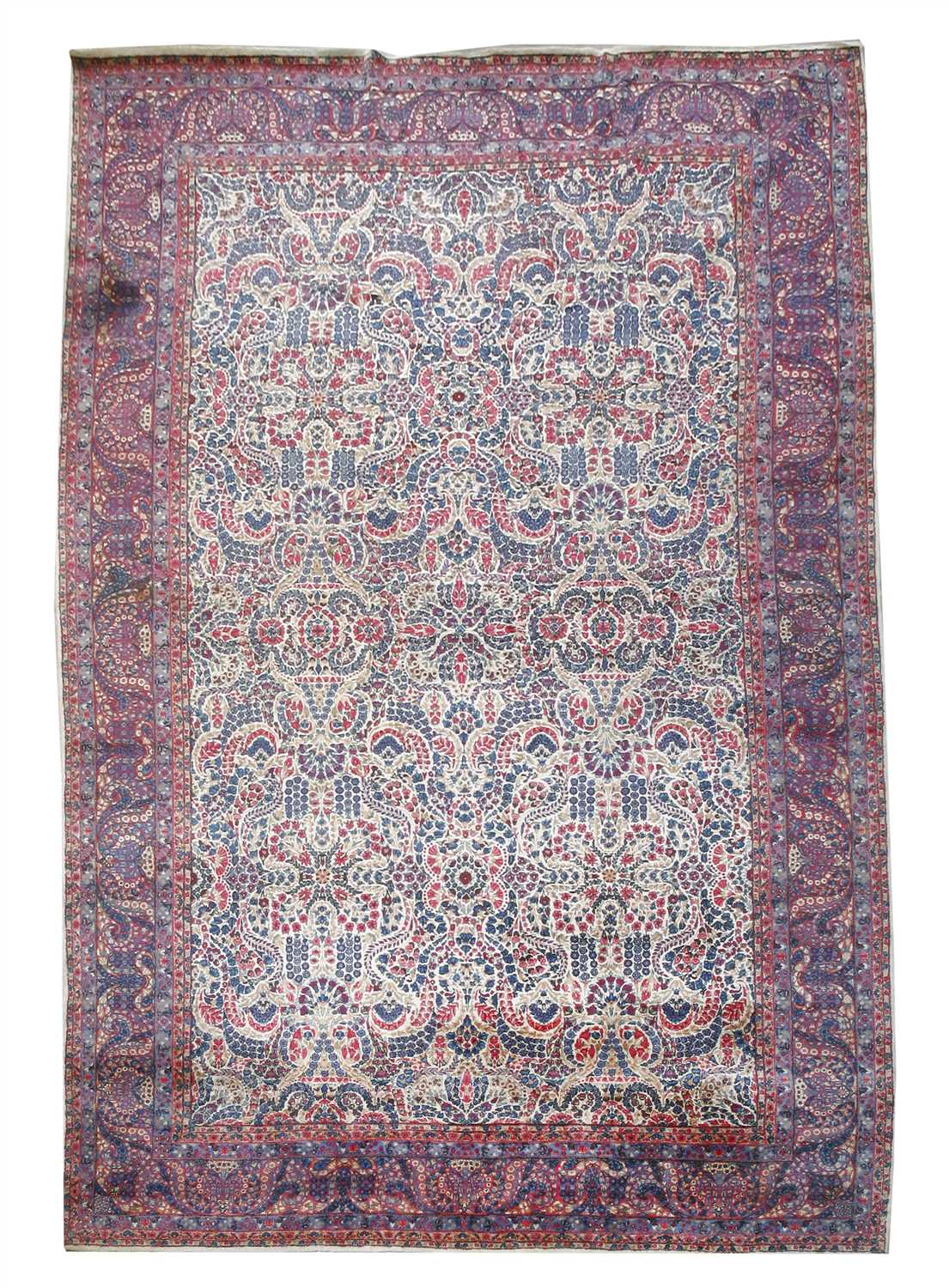 Lot 243 - A large Kirman carpet