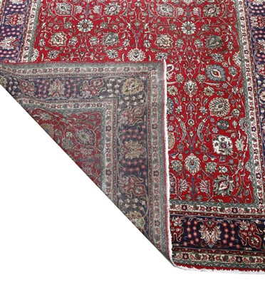 Lot 276 - A large Tabriz carpet