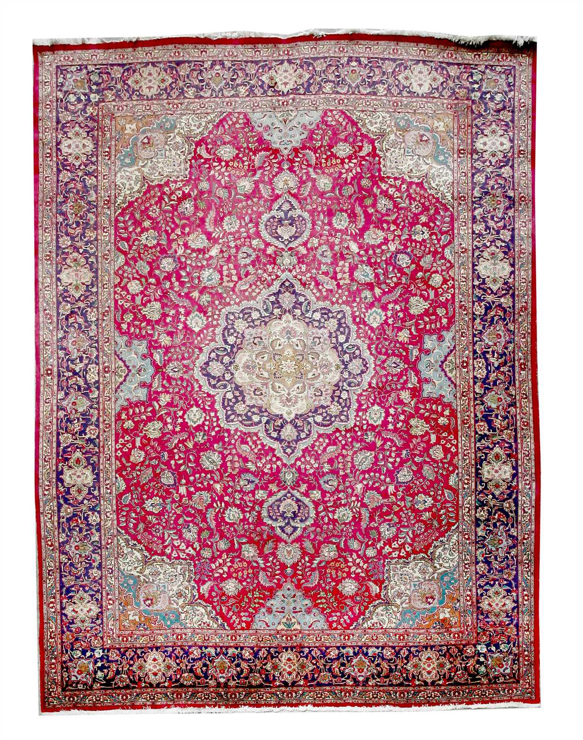 Lot 7 - A large Kashan carpet,