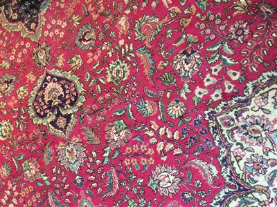 Lot 7 - A large Kashan carpet