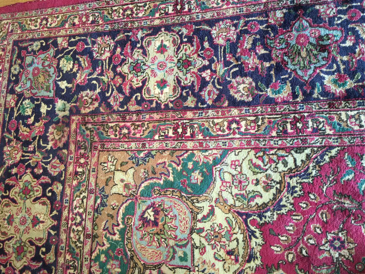 Lot 7 - A large Kashan carpet,