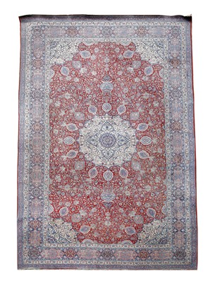 Lot 145 - A large Tabriz carpet