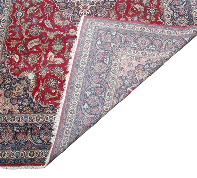 Lot 266 - A large Kashan carpet